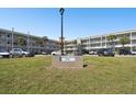 Well maintained condo complex; sign in foreground reads: Chinese Cathay, 2070 at 2070 World Parkway Blvd # 34, Clearwater, FL 33763