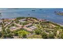 Overhead view showcasing lush landscaping and a vibrant community with easy access to waterfront at 2700 Bayshore Blvd # 588, Dunedin, FL 34698