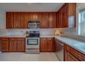Spacious kitchen featuring stainless steel appliances, and stylish backsplash at 2700 Bayshore Blvd # 588, Dunedin, FL 34698