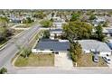 A beautiful, single-story home with a paved driveway in a friendly neighborhood at 7205 Mayfield Dr, Port Richey, FL 34668