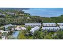 Stunning aerial view of townhomes and nearby waterway at 1500 Sunset Rd # G4, Tarpon Springs, FL 34689