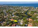 Beautiful aerial view of a waterfront community, showcasing the home's proximity to the water at 3316 S Shamrock Rd, Tampa, FL 33629