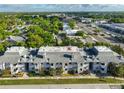 Aerial view of a multi-unit residential building complex with mature landscaping in a desirable location at 4405 W Fair Oaks Ave # 9, Tampa, FL 33611