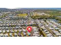 Scenic aerial view of a waterfront community with canals, lush greenery, and easy access to the ocean at 128 E Saint Johns Way, Apollo Beach, FL 33572
