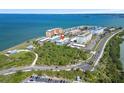 Coastal condominium community with water views, convenient beach access, and well-maintained landscaping at 5 Island Park Pl # 305, Dunedin, FL 34698