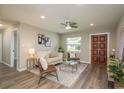 A bright living room with a modern rug and stylish furniture at 146 82Nd N Ave, St Petersburg, FL 33702