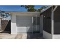 Attached one car garage provides convenient parking and storage at 2122 Holiday Dr, Holiday, FL 34691