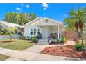 Lovely one-story home with well-maintained lawn, walkway, lush landscaping, and inviting curb appeal at 2328 Dartmouth N Ave, St Petersburg, FL 33713