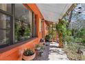 Cozy porch with tiled floors and decorative plants at 33357 Westwood Dr, Ridge Manor, FL 33523