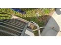 Close up showing damage to the HVAC system at 29434 Tansy Pass, Wesley Chapel, FL 33543