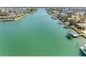 Expansive waterfront view showcases the calm waters and the community's serene coastal living at 540 115Th Ave, Treasure Island, FL 33706