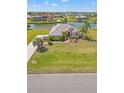Well-manicured home featuring lush landscaping, and beautiful views, with convenient street access at 6181 9Th Avenue Ne Cir, Bradenton, FL 34212