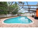 Relaxing screened-in pool area perfect for outdoor enjoyment and entertaining at 12762 98Th St, Largo, FL 33773