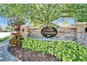 Stone monument sign with the 'Crosby Crossings' community name displayed at 2510 Cross More St, Valrico, FL 33594