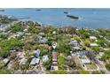 Aerial shot of a home with a coastal view, showcasing its location in a residential neighborhood near the water at 515 Orange St, Palm Harbor, FL 34683