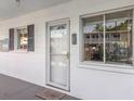 Charming front porch with decorative details, a cozy welcome to this inviting home at 1552 Pleasant Rd # J4, Bradenton, FL 34207