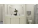 Bright bathroom featuring a double vanity, marble countertop, white cabinetry, and a shower with a curtain at 18448 Serene Lake Loop, Lutz, FL 33548