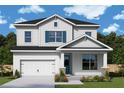 Charming two-story home with white siding, black roof, blue shutters, and stone accents at 5011 21St N Ave, St Petersburg, FL 33710