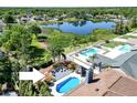 The aerial view highlights a relaxing pool and deck, perfect for outdoor enjoyment at 10404 Crestfield Dr, Riverview, FL 33569