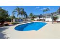 Beautiful pool with lounge area and gazebo, perfect for outdoor relaxation and entertaining at 10404 Crestfield Dr, Riverview, FL 33569