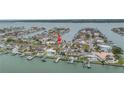 Overhead shot highlighting its prime location near waterways and other waterfront homes at 11755 7Th E St, Treasure Island, FL 33706