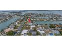 Waterfront community featuring homes with boat access and picturesque canals, aerial view at 11755 7Th E St, Treasure Island, FL 33706