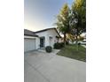 Charming single-story home with a well-maintained front yard and driveway at 12639 Lemon Pepper Dr, Riverview, FL 33578
