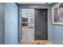 A view through an open hallway into the kitchen and living spaces beyond at 19816 Gulf Boulevard # 201, Indian Shores, FL 33785