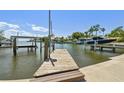 Private dock with boat lift, offering direct access to the waterway for boating enthusiasts at 6667 28Th S St, St Petersburg, FL 33712