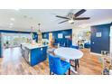Large open concept kitchen flows into the Gathering room and additional dining area at 1851 Glenville Dr, Clearwater, FL 33765