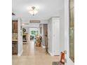 Elegant foyer with tile flooring leading to the living spaces at 5317 Black Pine Dr, Tampa, FL 33624
