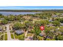 Aerial view of neighborhood with a home close to a lake at 1726 25Th S Ave, St Petersburg, FL 33712