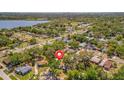 Overhead neighborhood view of home close to a lake with a red pin at 1726 25Th S Ave, St Petersburg, FL 33712