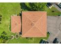 Aerial view showcases the home's roof, yard, and proximity to the surrounding neighborhood at 2934 Lichen Ln # A, Clearwater, FL 33760