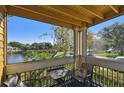 Balcony features seating and a view of the lake at 115 112Th Ne Ave # 1027, St Petersburg, FL 33716