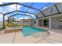 Screened-in pool and spa with a water feature and lots of space for entertaining friends and Gathering at 2121 Secret Cv, Odessa, FL 33556