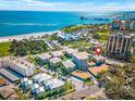 Aerial view of complex near beach, pier, pool and other buildings with water view at 615 10Th Ne Ave # 1, St Petersburg, FL 33701