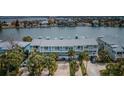 Breathtaking aerial view of condo complex on the water with multiple parking spots at 2515 Bay Blvd # A, Indian Rocks Beach, FL 33785