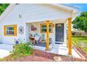 Welcoming front porch with decorative accents and updated design elements at 3435 40Th N St, St Petersburg, FL 33713