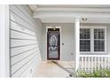 Close-up of the front door with decorative glass, sidelights, and house number at 37438 Picketts Mill Ave, Zephyrhills, FL 33542
