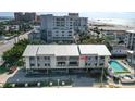 Stunning building near the beach, showcasing an in-ground pool for relaxation and enjoyment at 15 Glendale St # B6, Clearwater Beach, FL 33767