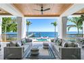 Inviting outdoor patio featuring comfortable seating, water views, and a serene waterfront setting at 1695 Brightwaters Ne Blvd, St Petersburg, FL 33704