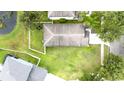 An aerial view of a spacious backyard, perfect for outdoor activities and relaxation at 18150 Leamington Ln, Land O Lakes, FL 34638
