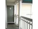 Condo entryway showcasing the front door with unit number and secure entry at 4107 Chatham Oak Ct # 326, Tampa, FL 33624
