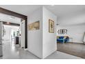 Open-concept home with a combined living room, dining area, and modern design at 8258 Forest Cir, Seminole, FL 33776