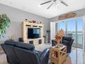 Cozy living room with stylish decor, comfortable seating, and scenic water views enhancing the ambiance at 200 Brightwater Dr # 10, Clearwater Beach, FL 33767