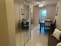 Charming dining area featuring seating for four and bright natural light at 5990 Terrace Park N Dr # 109, St Petersburg, FL 33709