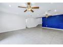 Bright living room with recessed lighting, ceiling fans and tile flooring at 783 41St Ne Ave, St Petersburg, FL 33703