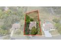 Aerial shot showcasing the home, surrounding lot, and proximity to nearby community features at 18241 Autumn Lake Blvd, Hudson, FL 34667
