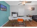 Bright, open living area with a modern desk space and comfortable seating at 1900 68Th N St # 110, St Petersburg, FL 33710